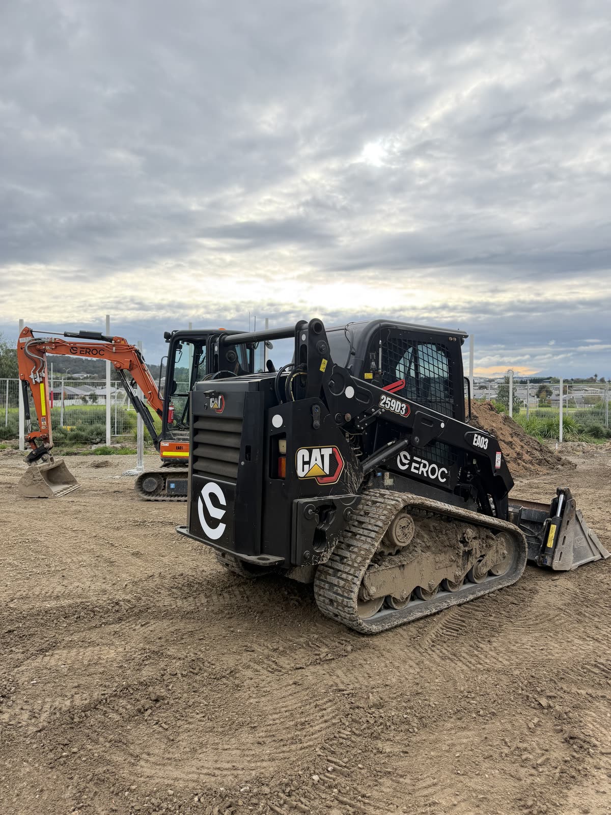 EROC CAT posi-track and excavators on a civil site