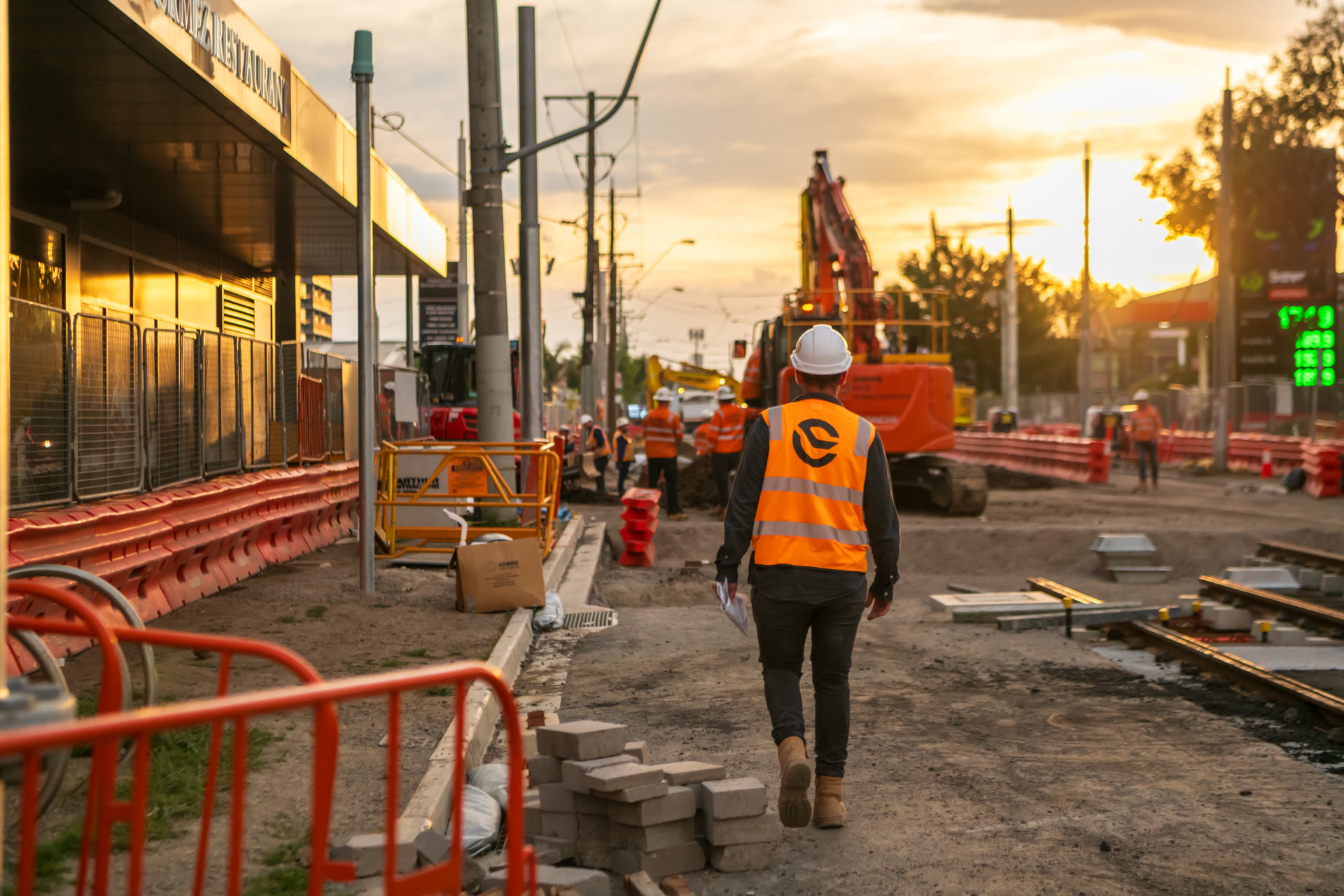EROC engineer walking the corridor works at dusk
